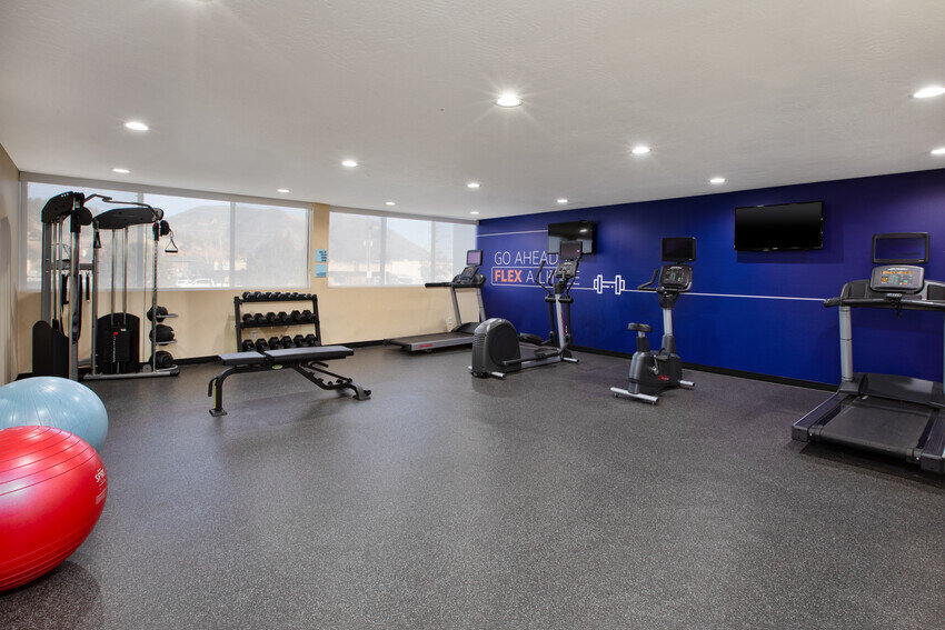 a gym with exercise equipment