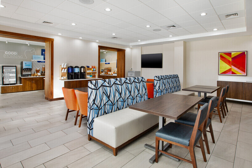 a room with a table and chairs