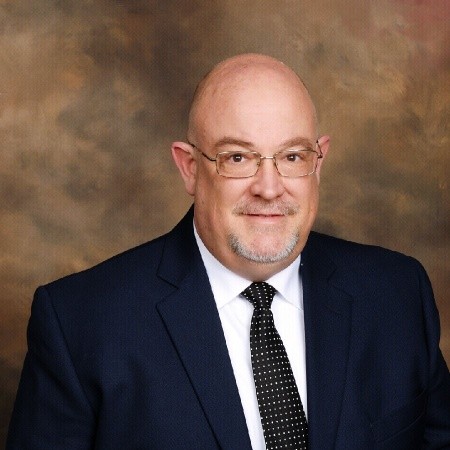 a man in a suit and tie a man in a suit and tie