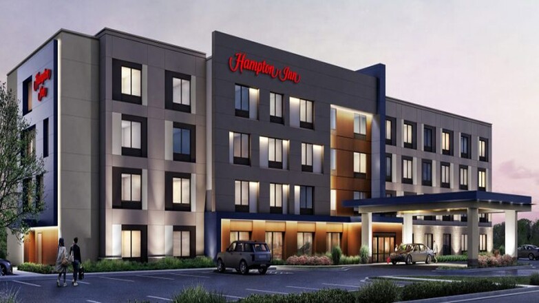 a building with cars parked in front of it